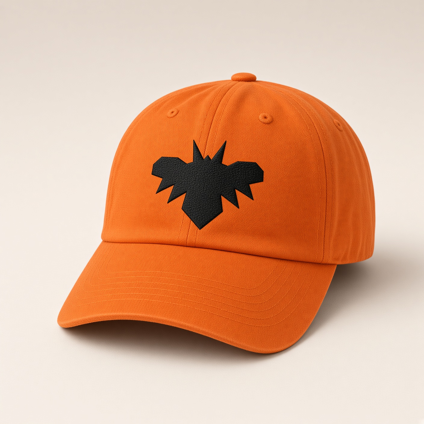 Orange dad hat with a small black embroidered SpaceBat emblem.